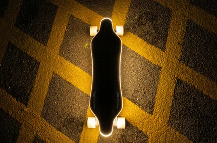 Electric skateboard with illuminated wheels